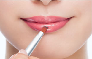 For plump-looking lips, add some lip gloss to the center of your lips